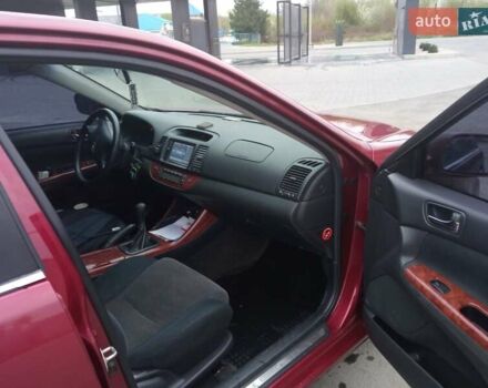 Красный Тойота Камри, объемом двигателя 2.4 л и пробегом 460 тыс. км за 5100 $, фото 2 на Automoto.ua