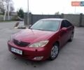 Красный Тойота Камри, объемом двигателя 2.4 л и пробегом 460 тыс. км за 5100 $, фото 1 на Automoto.ua