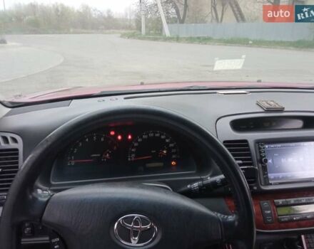 Красный Тойота Камри, объемом двигателя 2.4 л и пробегом 460 тыс. км за 5100 $, фото 5 на Automoto.ua