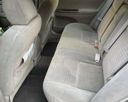 Красный Тойота Камри, объемом двигателя 2.4 л и пробегом 301 тыс. км за 5300 $, фото 17 на Automoto.ua