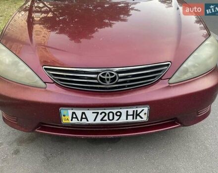 Красный Тойота Камри, объемом двигателя 2.4 л и пробегом 301 тыс. км за 5300 $, фото 21 на Automoto.ua