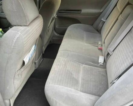 Красный Тойота Камри, объемом двигателя 2.4 л и пробегом 301 тыс. км за 4499 $, фото 12 на Automoto.ua