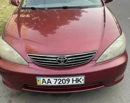 Красный Тойота Камри, объемом двигателя 2.4 л и пробегом 301 тыс. км за 4499 $, фото 9 на Automoto.ua