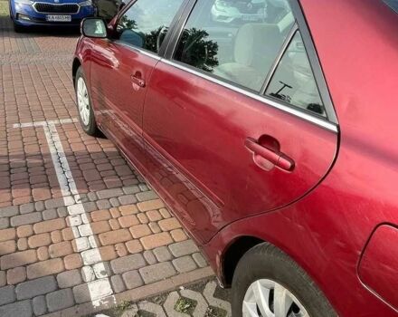 Красный Тойота Камри, объемом двигателя 2.4 л и пробегом 301 тыс. км за 4499 $, фото 5 на Automoto.ua