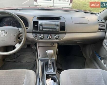 Красный Тойота Камри, объемом двигателя 2.4 л и пробегом 301 тыс. км за 5300 $, фото 14 на Automoto.ua