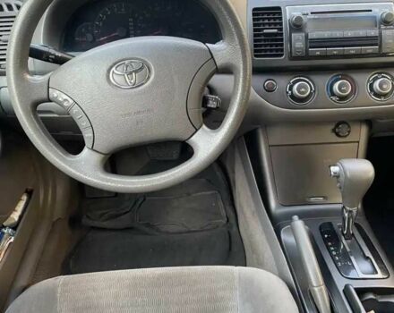 Красный Тойота Камри, объемом двигателя 2.4 л и пробегом 301 тыс. км за 4499 $, фото 13 на Automoto.ua