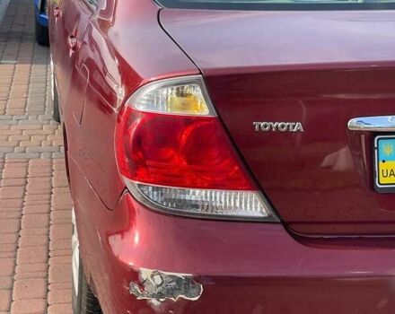 Красный Тойота Камри, объемом двигателя 2.4 л и пробегом 301 тыс. км за 5300 $, фото 7 на Automoto.ua