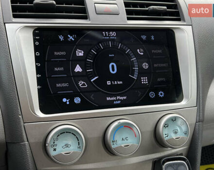 Красный Тойота Камри, объемом двигателя 2.36 л и пробегом 211 тыс. км за 8850 $, фото 12 на Automoto.ua