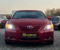 Червоний Тойота Камрі, об'ємом двигуна 2.4 л та пробігом 211 тис. км за 8850 $, фото 1 на Automoto.ua