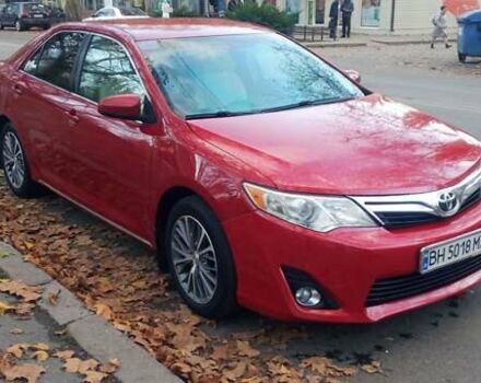 Красный Тойота Камри, объемом двигателя 2.49 л и пробегом 188 тыс. км за 11500 $, фото 1 на Automoto.ua