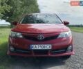 Красный Тойота Камри, объемом двигателя 2.5 л и пробегом 195 тыс. км за 12300 $, фото 1 на Automoto.ua