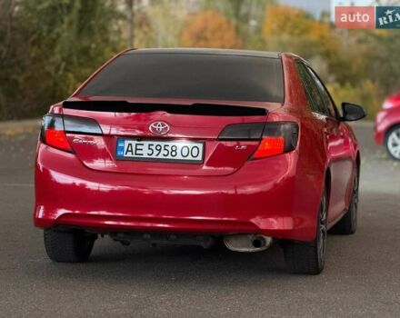 Тойота Камри 2013 в Кривом Роге на Automoto.ua Красный Тойота Камри, объемом двигателя 2.5 л и пробегом 177 тыс. км за 10700 $, фото 14 на Automoto.ua