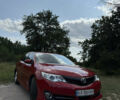 Красный Тойота Камри, объемом двигателя 2.49 л и пробегом 161 тыс. км за 13500 $, фото 1 на Automoto.ua