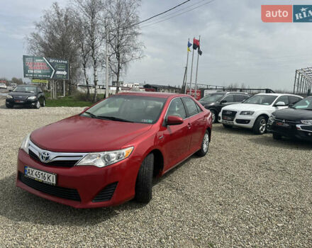 Красный Тойота Камри, объемом двигателя 2.49 л и пробегом 153 тыс. км за 12750 $, фото 1 на Automoto.ua