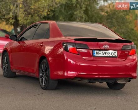 Тойота Камри 2013 в Кривом Роге на Automoto.ua Красный Тойота Камри, объемом двигателя 2.5 л и пробегом 177 тыс. км за 10700 $, фото 16 на Automoto.ua