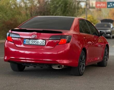 Тойота Камри 2013 в Кривом Роге на Automoto.ua Красный Тойота Камри, объемом двигателя 2.5 л и пробегом 177 тыс. км за 10700 $, фото 13 на Automoto.ua