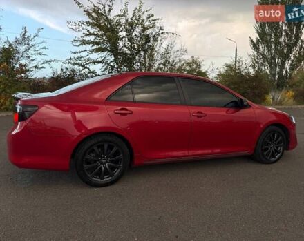 Тойота Камри 2013 в Кривом Роге на Automoto.ua Красный Тойота Камри, объемом двигателя 2.5 л и пробегом 177 тыс. км за 10700 $, фото 19 на Automoto.ua