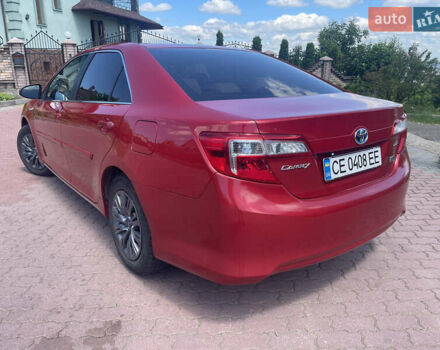 Червоний Тойота Камрі, об'ємом двигуна 2.49 л та пробігом 243 тис. км за 13200 $, фото 3 на Automoto.ua