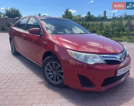 Червоний Тойота Камрі, об'ємом двигуна 2.49 л та пробігом 243 тис. км за 13200 $, фото 1 на Automoto.ua