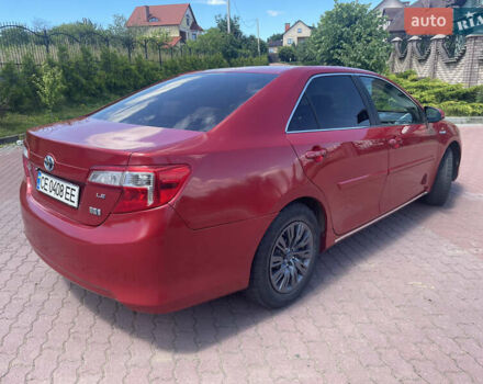 Червоний Тойота Камрі, об'ємом двигуна 2.49 л та пробігом 243 тис. км за 13200 $, фото 2 на Automoto.ua