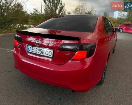 Тойота Камри 2013 в Кривом Роге на Automoto.ua Красный Тойота Камри, объемом двигателя 2.5 л и пробегом 177 тыс. км за 10700 $, фото 21 на Automoto.ua