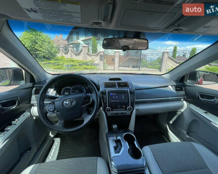 Червоний Тойота Камрі, об'ємом двигуна 2.49 л та пробігом 243 тис. км за 13200 $, фото 11 на Automoto.ua