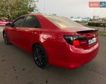 Тойота Камри 2013 в Кривом Роге на Automoto.ua Красный Тойота Камри, объемом двигателя 2.5 л и пробегом 177 тыс. км за 10700 $, фото 24 на Automoto.ua