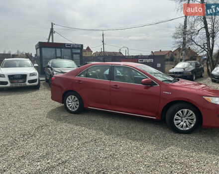 Красный Тойота Камри, объемом двигателя 2.49 л и пробегом 153 тыс. км за 12750 $, фото 2 на Automoto.ua