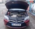 Красный Тойота Камри, объемом двигателя 2.49 л и пробегом 162 тыс. км за 11700 $, фото 5 на Automoto.ua