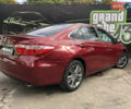 Красный Тойота Камри, объемом двигателя 2.49 л и пробегом 118 тыс. км за 12700 $, фото 4 на Automoto.ua