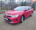 Красный Тойота Камри, объемом двигателя 2.49 л и пробегом 181 тыс. км за 14700 $, фото 1 на Automoto.ua