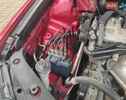 Красный Тойота Камри, объемом двигателя 2.49 л и пробегом 181 тыс. км за 14700 $, фото 19 на Automoto.ua