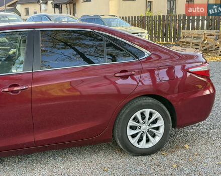 Красный Тойота Камри, объемом двигателя 2.49 л и пробегом 185 тыс. км за 11700 $, фото 7 на Automoto.ua