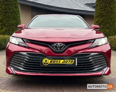 Красный Тойота Камри, объемом двигателя 2.5 л и пробегом 123 тыс. км за 17600 $, фото 1 на Automoto.ua