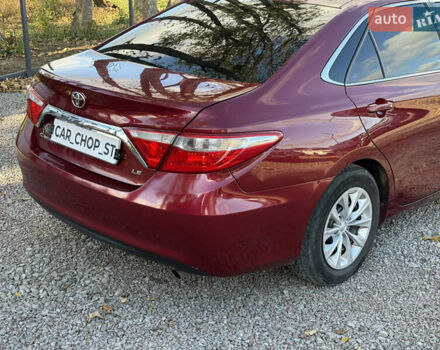 Красный Тойота Камри, объемом двигателя 2.49 л и пробегом 185 тыс. км за 11700 $, фото 12 на Automoto.ua