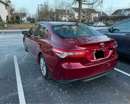 Красный Тойота Камри, объемом двигателя 2.5 л и пробегом 49 тыс. км за 5600 $, фото 1 на Automoto.ua
