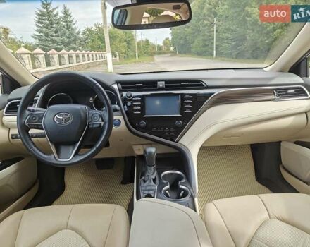 Красный Тойота Камри, объемом двигателя 2.49 л и пробегом 136 тыс. км за 24000 $, фото 27 на Automoto.ua