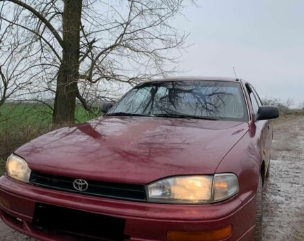 Красный Тойота Камри, объемом двигателя 2.2 л и пробегом 386 тыс. км за 800 $, фото 1 на Automoto.ua