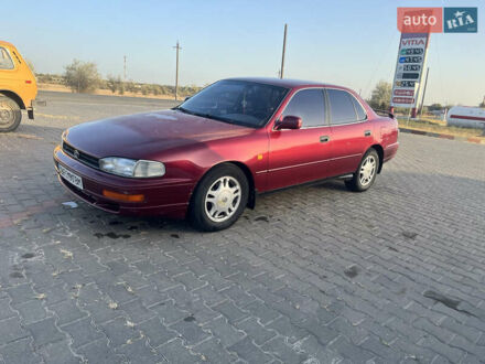 Червоний Тойота Камрі, об'ємом двигуна 2.96 л та пробігом 421 тис. км за 1200 $, фото 1 на Automoto.ua