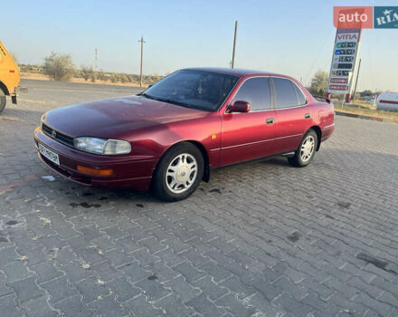 Червоний Тойота Камрі, об'ємом двигуна 2.96 л та пробігом 421 тис. км за 1200 $, фото 1 на Automoto.ua