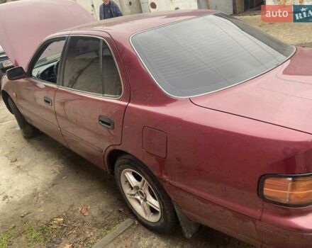 Красный Тойота Камри, объемом двигателя 3 л и пробегом 270 тыс. км за 1500 $, фото 1 на Automoto.ua