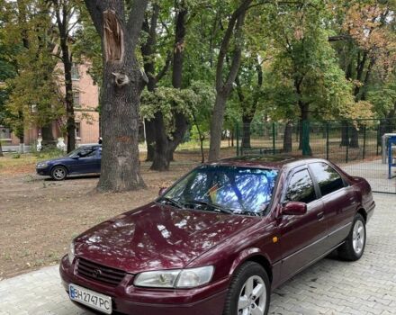 Красный Тойота Камри, объемом двигателя 3 л и пробегом 424 тыс. км за 4500 $, фото 1 на Automoto.ua