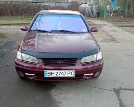 Красный Тойота Камри, объемом двигателя 3 л и пробегом 424 тыс. км за 4500 $, фото 1 на Automoto.ua
