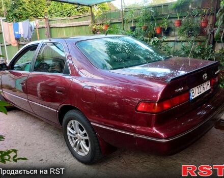 Красный Тойота Камри, объемом двигателя 2.2 л и пробегом 390 тыс. км за 3400 $, фото 1 на Automoto.ua