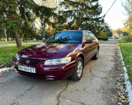 Красный Тойота Камри, объемом двигателя 3 л и пробегом 340 тыс. км за 2950 $, фото 1 на Automoto.ua