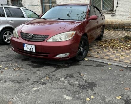 Красный Тойота Камри, объемом двигателя 2.4 л и пробегом 246 тыс. км за 4100 $, фото 1 на Automoto.ua