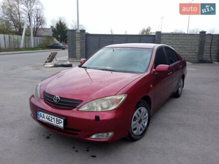 Красный Тойота Камри, объемом двигателя 2.4 л и пробегом 460 тыс. км за 5100 $, фото 1 на Automoto.ua