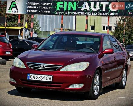 Червоний Тойота Камрі, об'ємом двигуна 2.36 л та пробігом 261 тис. км за 5950 $, фото 1 на Automoto.ua