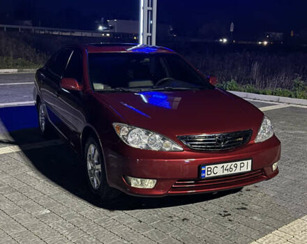 Красный Тойота Камри, объемом двигателя 3 л и пробегом 274 тыс. км за 6000 $, фото 1 на Automoto.ua