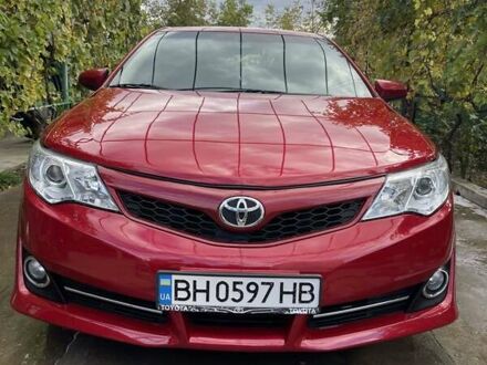 Красный Тойота Камри, объемом двигателя 2.5 л и пробегом 198 тыс. км за 10000 $, фото 1 на Automoto.ua